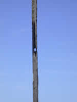 (Sun 06 - Close-up of the hole in the same pole.